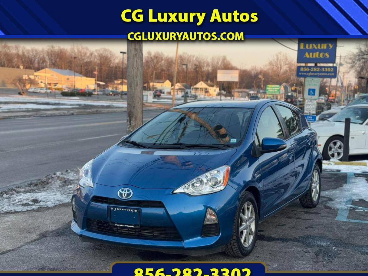 TOYOTA PRIUS C 2014 JTDKDTB38E1559979 image